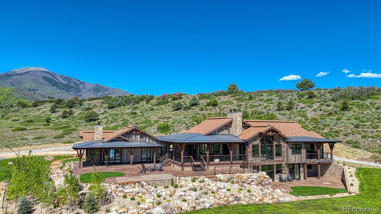 1768 Running Bear Cotopaxi, CO 81223 - Photo 13 of 50 a front view of a house with garden