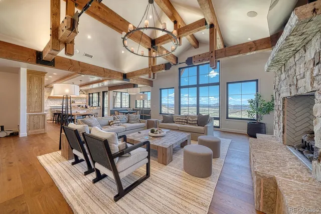a living room with lots of furniture and a flat screen tv