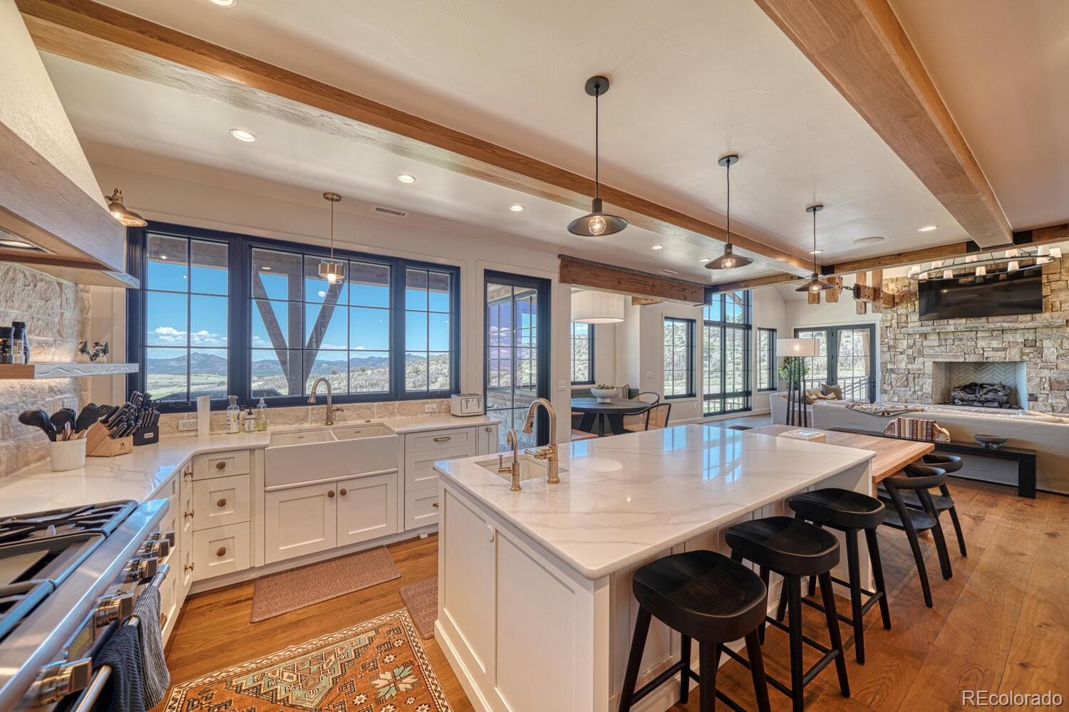 1768 Running Bear Cotopaxi, CO 81223 - Photo 19 of 50 a large kitchen with a table and chairs