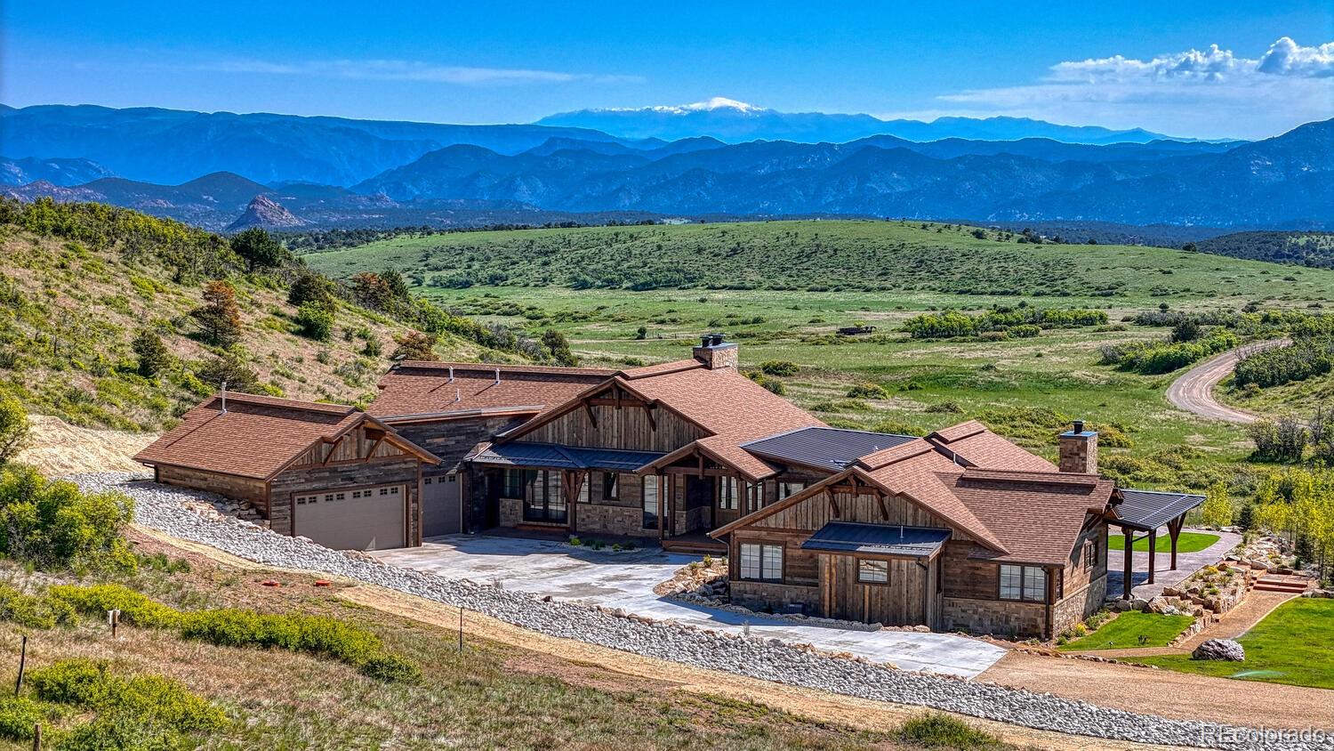 1768 Running Bear Cotopaxi, CO 81223 - Photo 2 of 50 a view of a big house with a big yard
