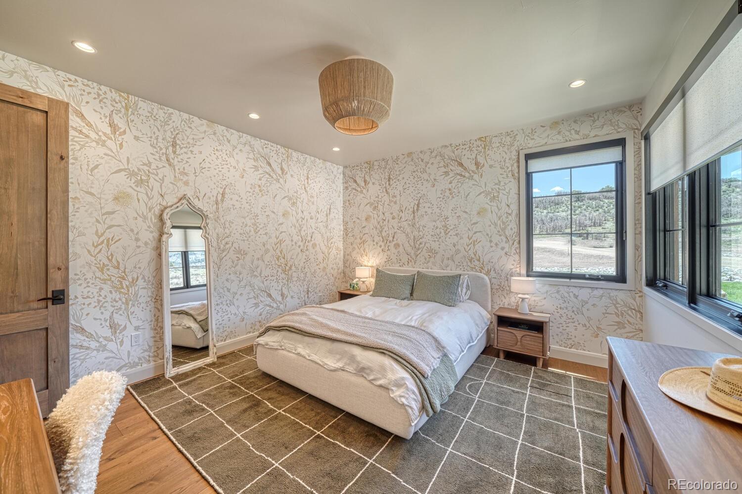 1768 Running Bear Cotopaxi, CO 81223 - Photo 32 of 50 a bedroom with a large bed and a window