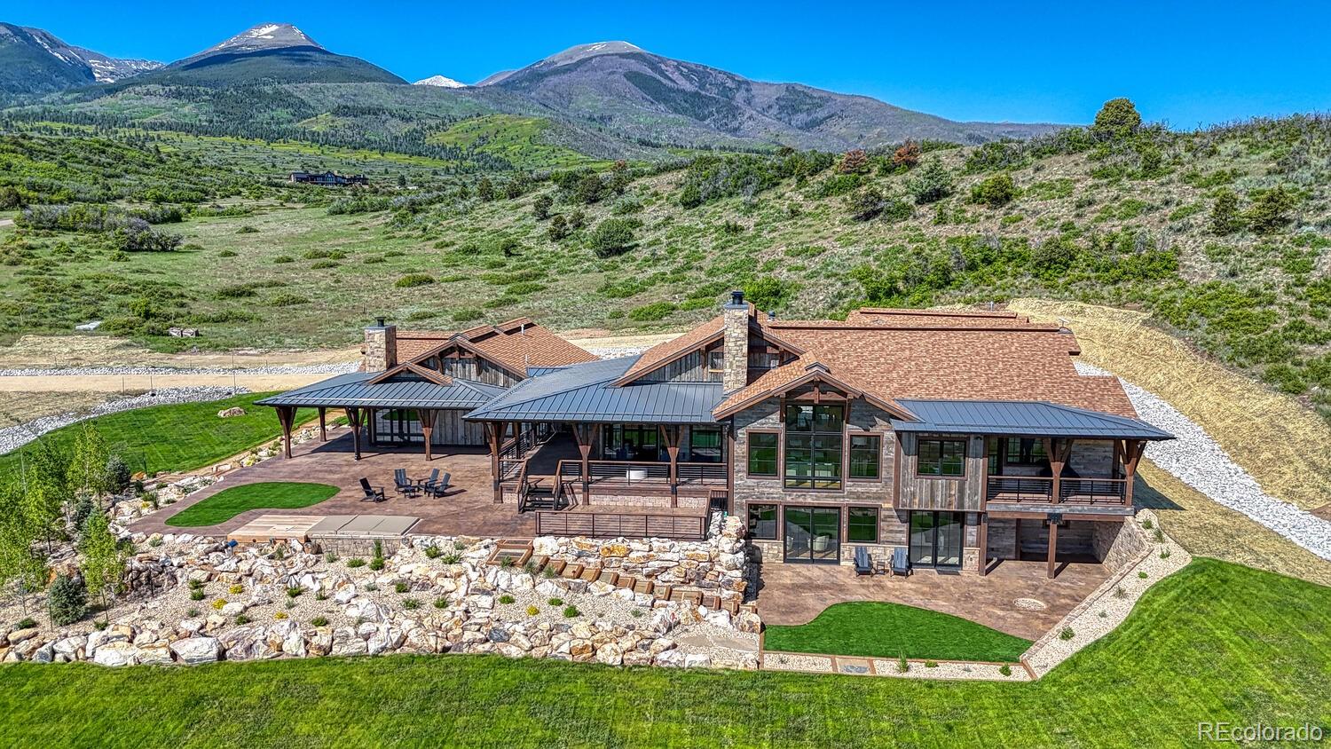 1768 Running Bear Cotopaxi, CO 81223 - Photo 6 of 50 an aerial view of a house with a yard table and chairs