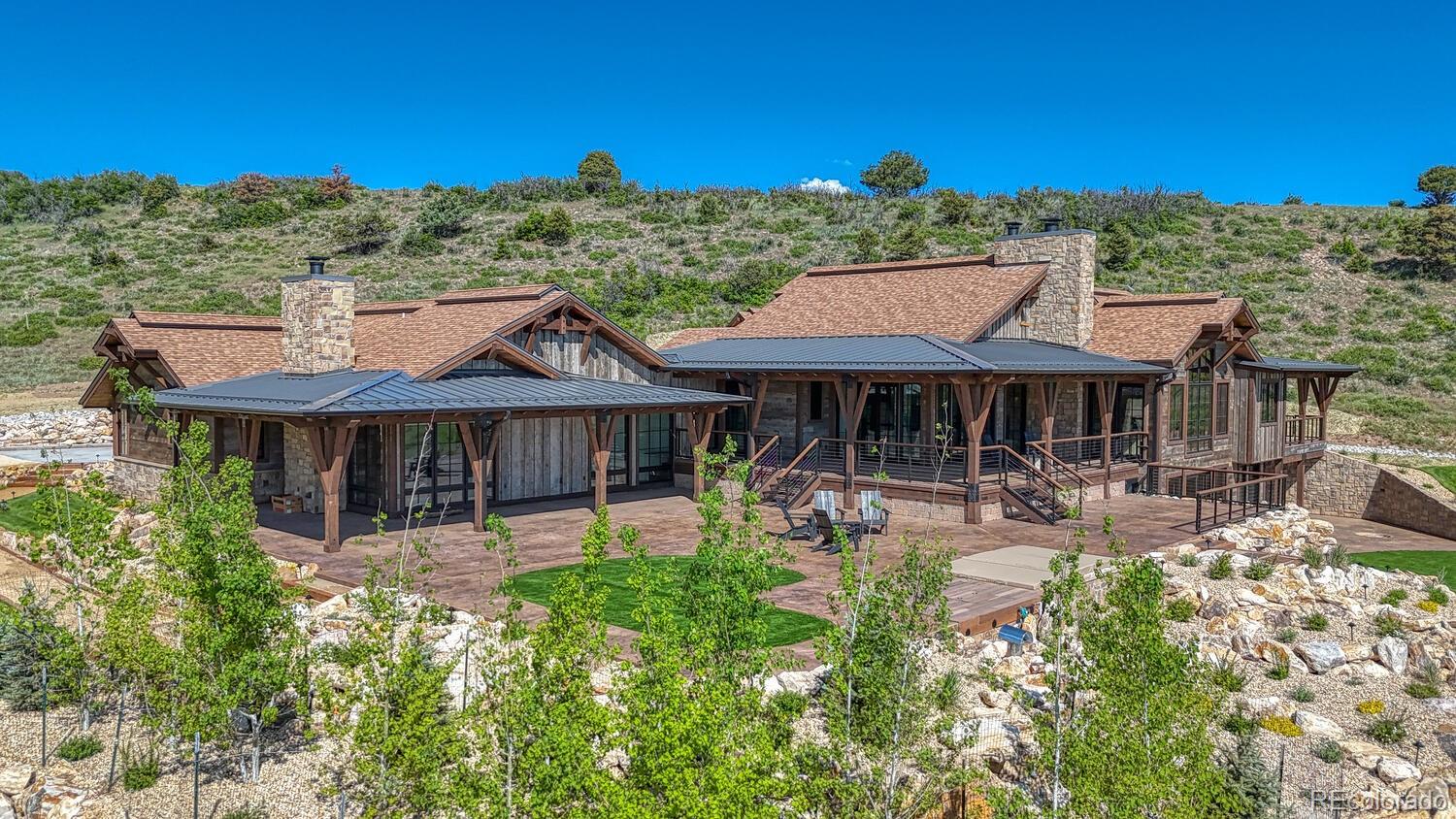 1768 Running Bear Cotopaxi, CO 81223 - Photo 9 of 50 a view of a house with patio and a garden