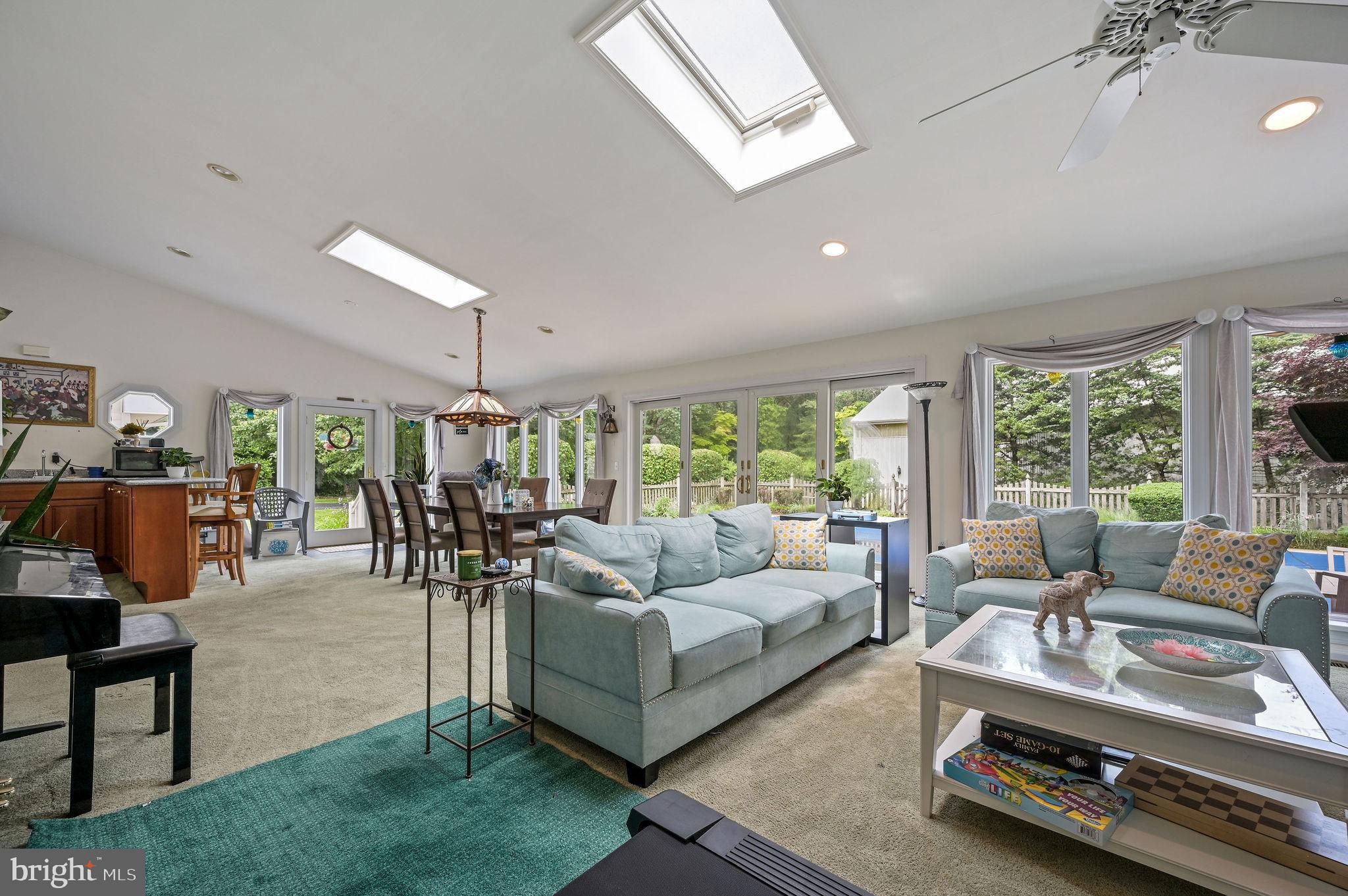 11142 Log Cabin Road Denton, MD 21629 - Photo 17 of 55 a living room with furniture and a large window