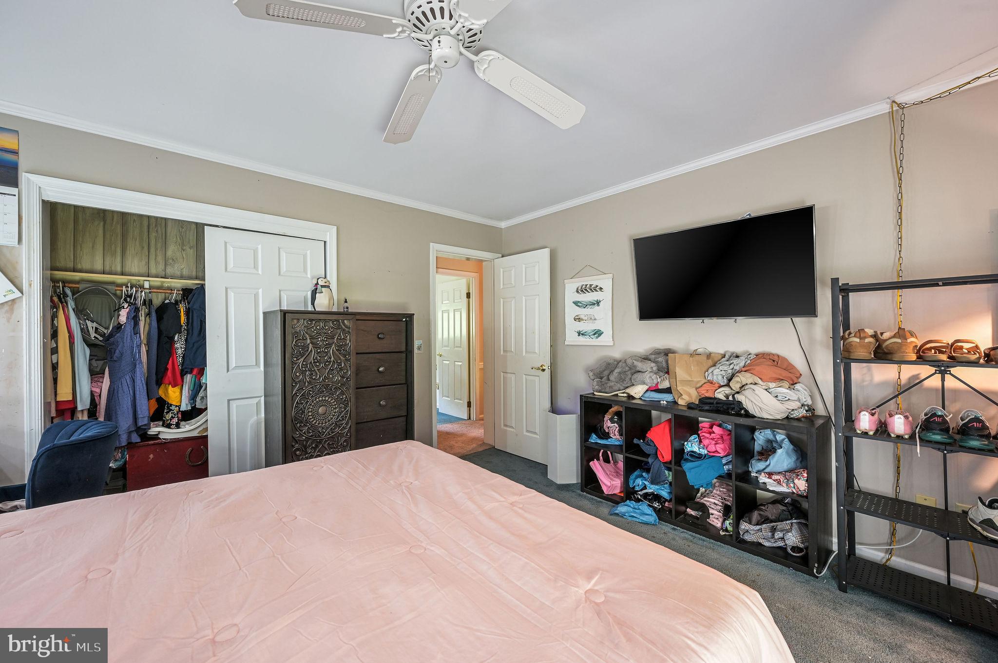 11142 Log Cabin Road Denton, MD 21629 - Photo 25 of 55 a bedroom with bed and flat tv screen