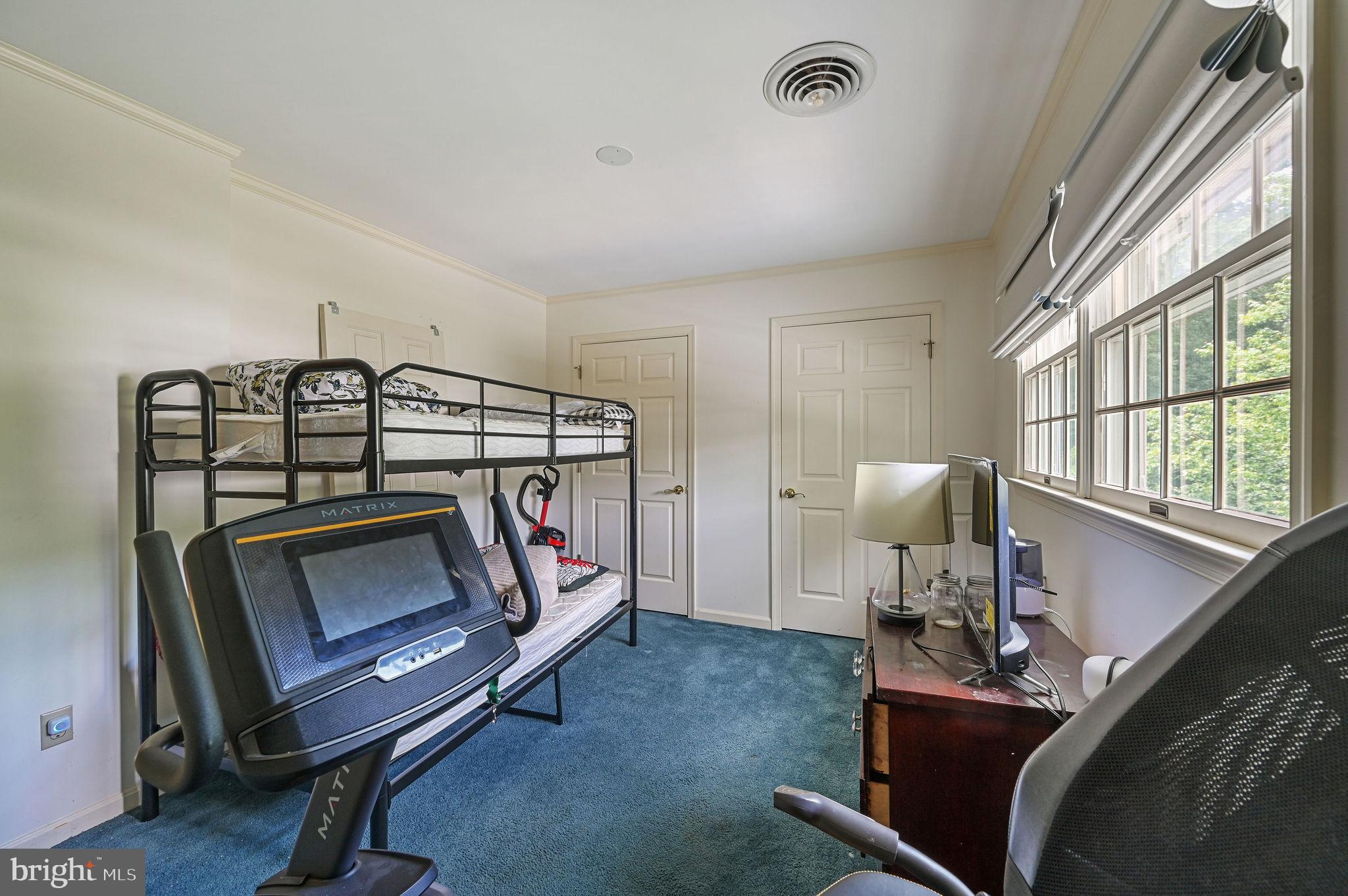 11142 Log Cabin Road Denton, MD 21629 - Photo 26 of 55 a living room with furniture a flat screen tv and a window