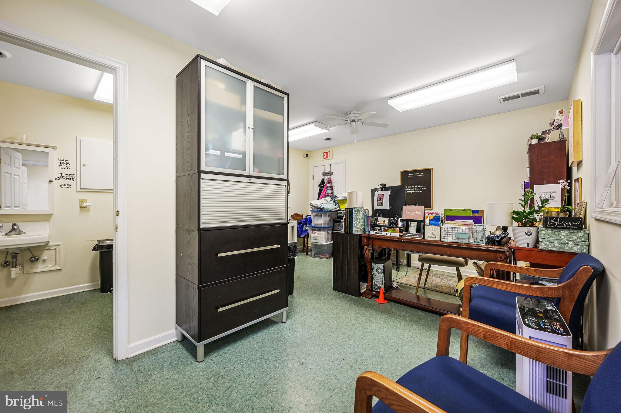 11142 Log Cabin Road Denton, MD 21629 - Photo 42 of 55 a room with furniture and a dining table with wooden floor