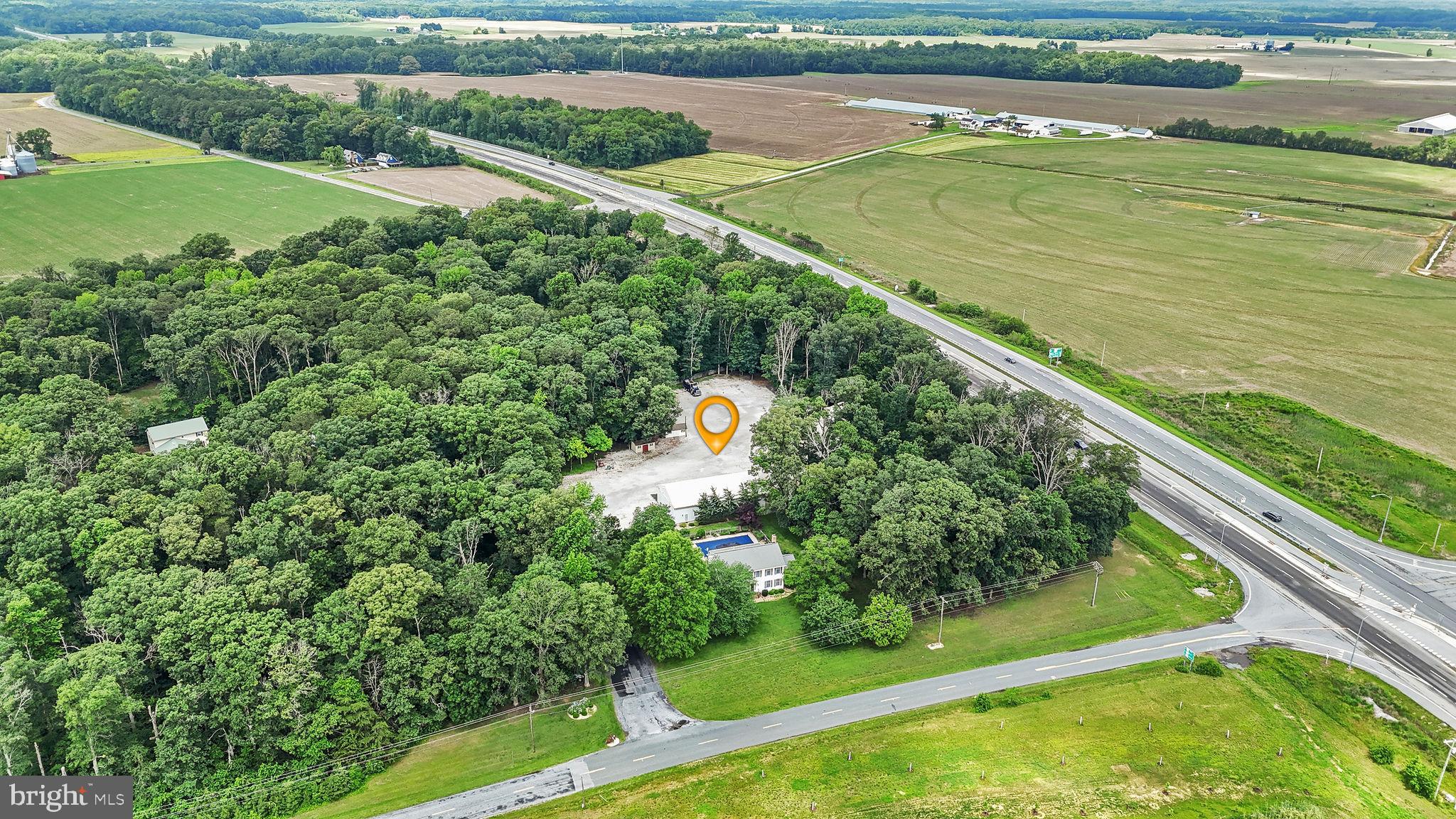 11142 Log Cabin Road Denton, MD 21629 - Photo 51 of 55 a view of a lake with a city view