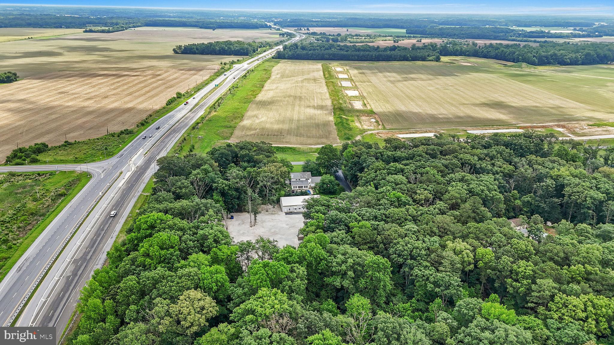 11142 Log Cabin Road Denton, MD 21629 - Photo 52 of 55 a view of a city from a lake view
