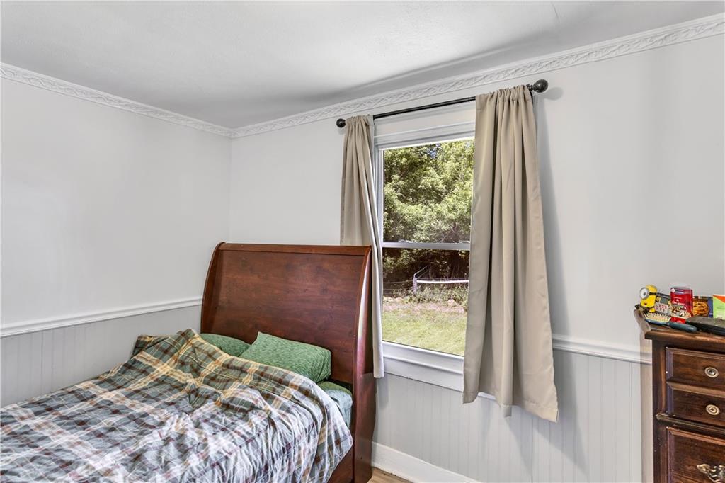 1747 Galilee Road Wampum, PA 16157 - Photo 14 of 32 Each bedroom offers a peaceful retreat with warm natural light.