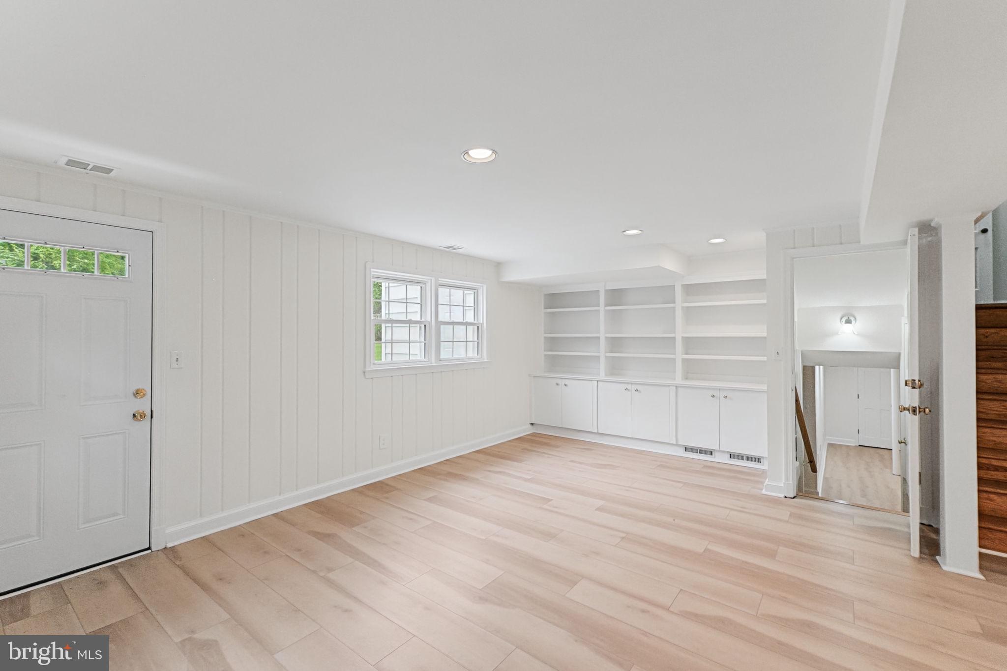5625 Ogden Road Bethesda, MD 20816 - Photo 33 of 49 Lower level recreation room with door to backyard