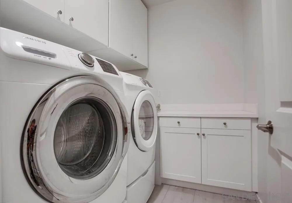 31534 Calle De Las Rosas Bonsall, CA 92003 - Photo 27 of 27 a utility room with dryer and washer