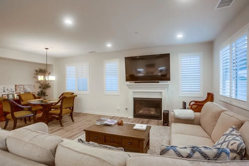 31534 Calle De Las Rosas Bonsall, CA 92003 - Photo 5 of 27 a living room with furniture fireplace and flat screen tv