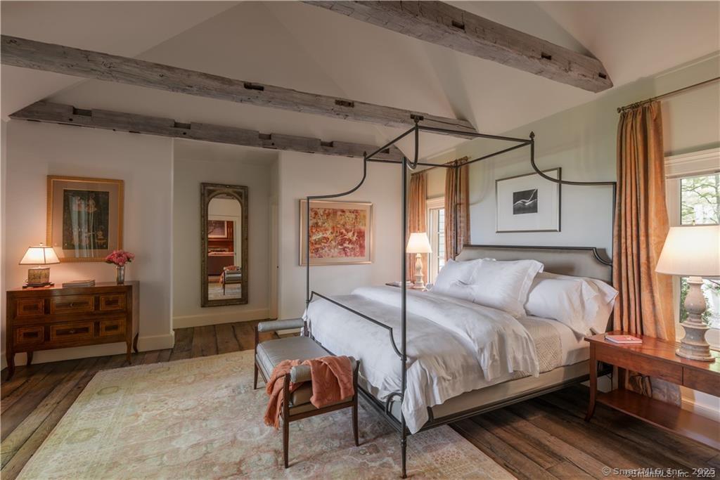 33 Nodine Pasture Road Kent, CT 06757 - Photo 11 of 40 a bedroom with a large bed and a window