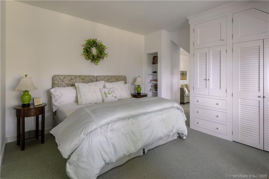 33 Nodine Pasture Road Kent, CT 06757 - Photo 15 of 40 a bedroom with a bed and a potted plant