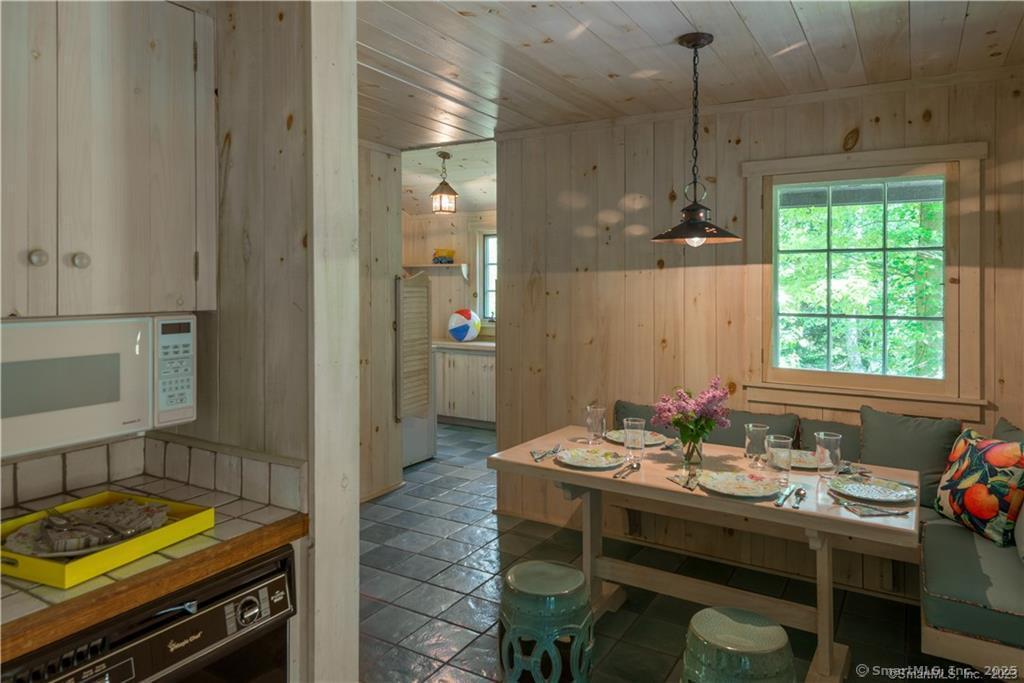 33 Nodine Pasture Road Kent, CT 06757 - Photo 25 of 40 a bathroom with a sink vanity and a mirror
