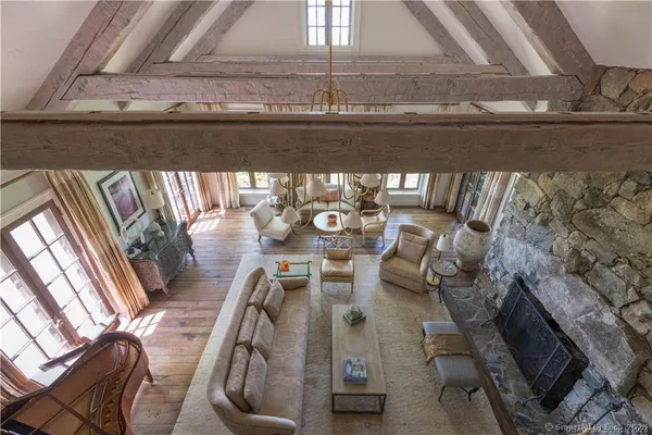 a view of a living room with furniture