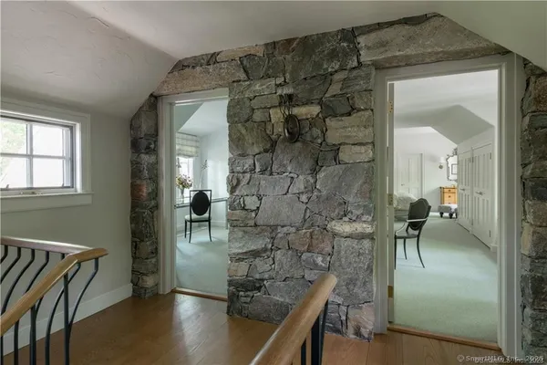 view of hall way with mirror