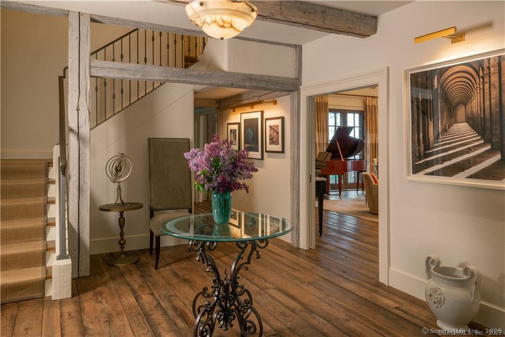 33 Nodine Pasture Road Kent, CT 06757 - Photo 3 of 40 a view of a livingroom with furniture and hardwood floor