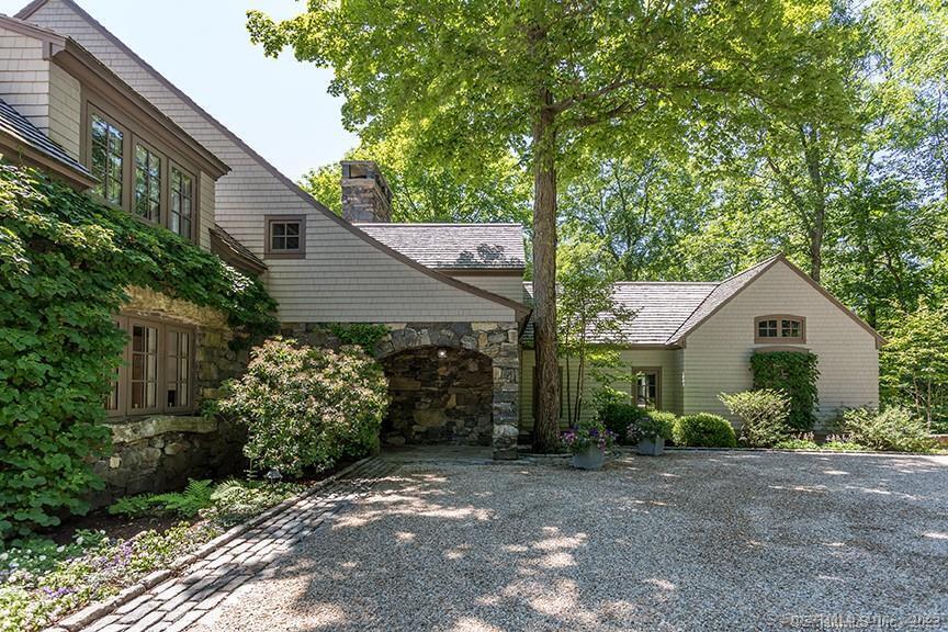 33 Nodine Pasture Road Kent, CT 06757 - Photo 32 of 40 a view of a house with large trees and plants