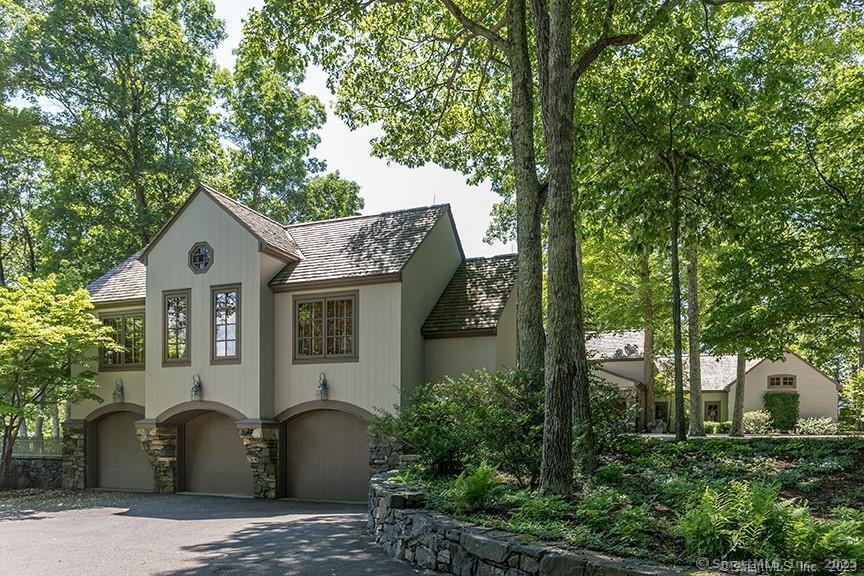 33 Nodine Pasture Road Kent, CT 06757 - Photo 34 of 40 a front view of a house with a garden