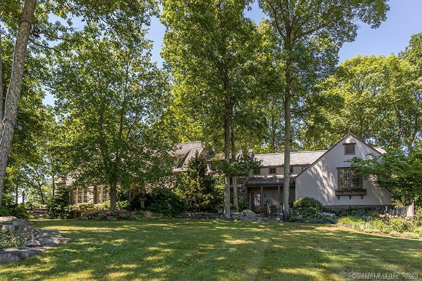 33 Nodine Pasture Road Kent, CT 06757 - Photo 35 of 40 a front view of a house with a garden
