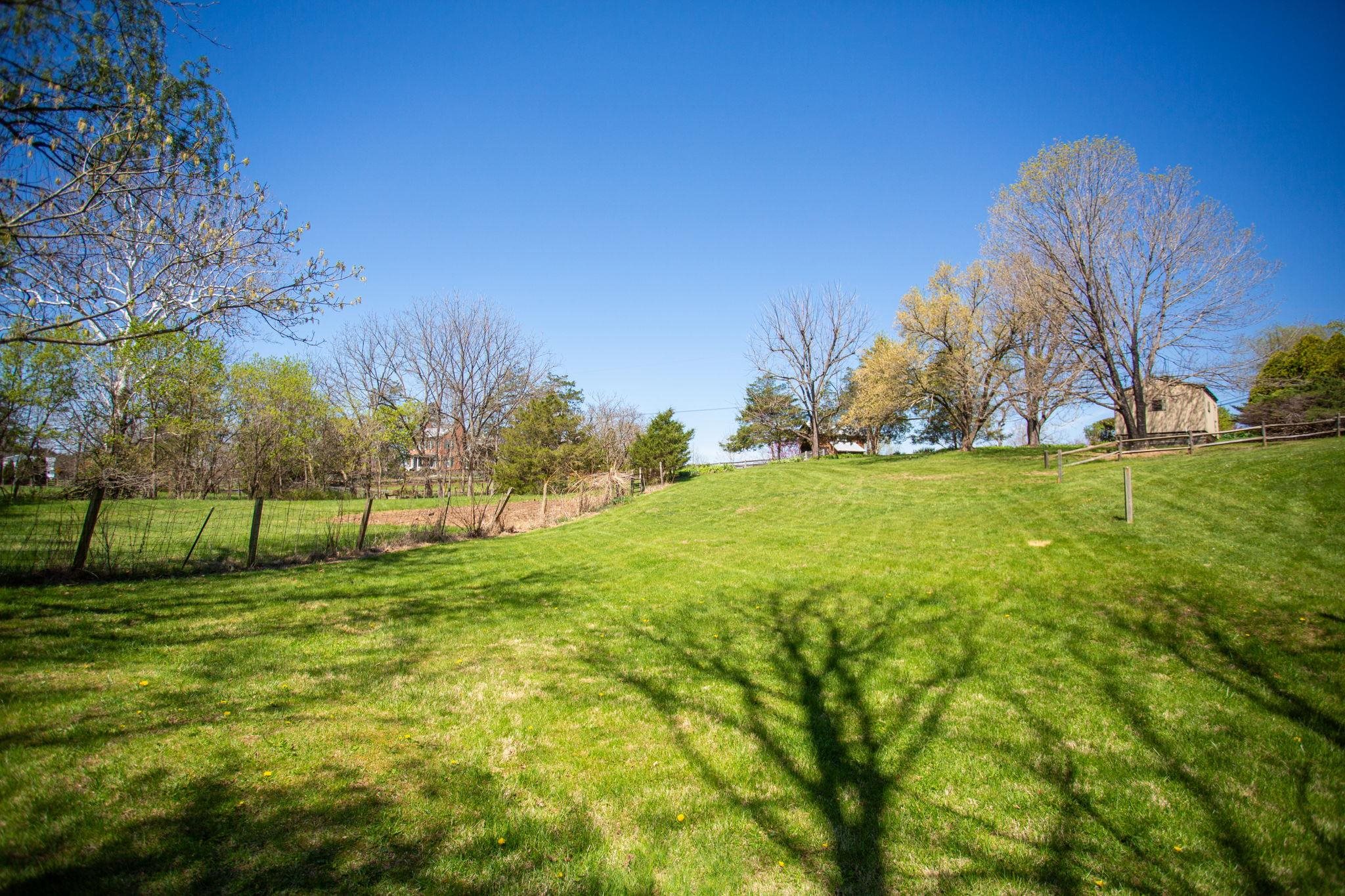 13004 Indian Trail Road Broadway, VA 22815 - Photo 53 of 56 a view of a golf course with a yard