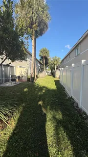 a backyard of a house with lots of green space