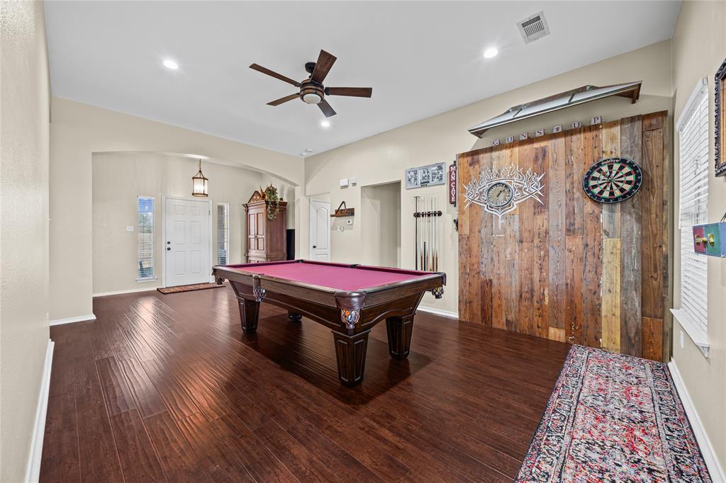 112 Springfield Lane Red Oak, TX 75165 - Photo 6 of 40 a room with wooden floors and pool table