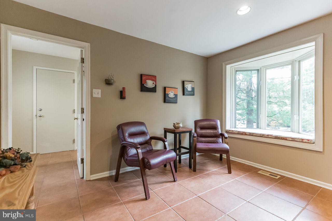 540 Harriton Road Bryn Mawr, PA 19010 - Photo 14 of 35 a work room with furniture and two window
