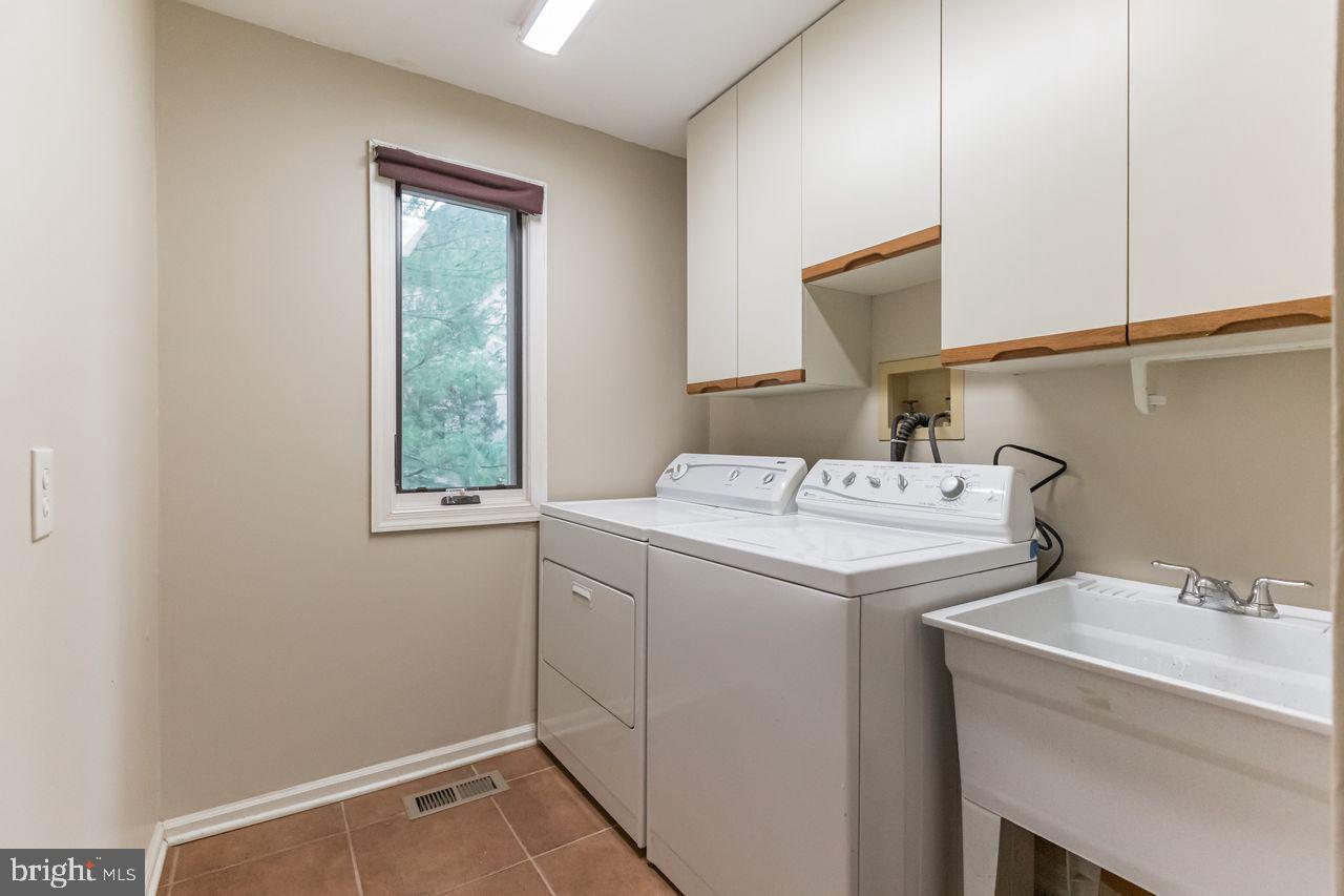 540 Harriton Road Bryn Mawr, PA 19010 - Photo 15 of 35 a utility room with dryer and washer