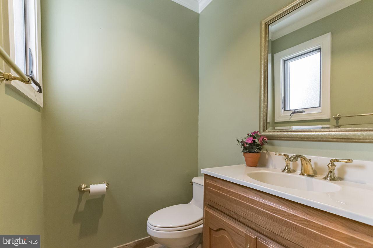 540 Harriton Road Bryn Mawr, PA 19010 - Photo 16 of 35 a bathroom with a sink and a toilet