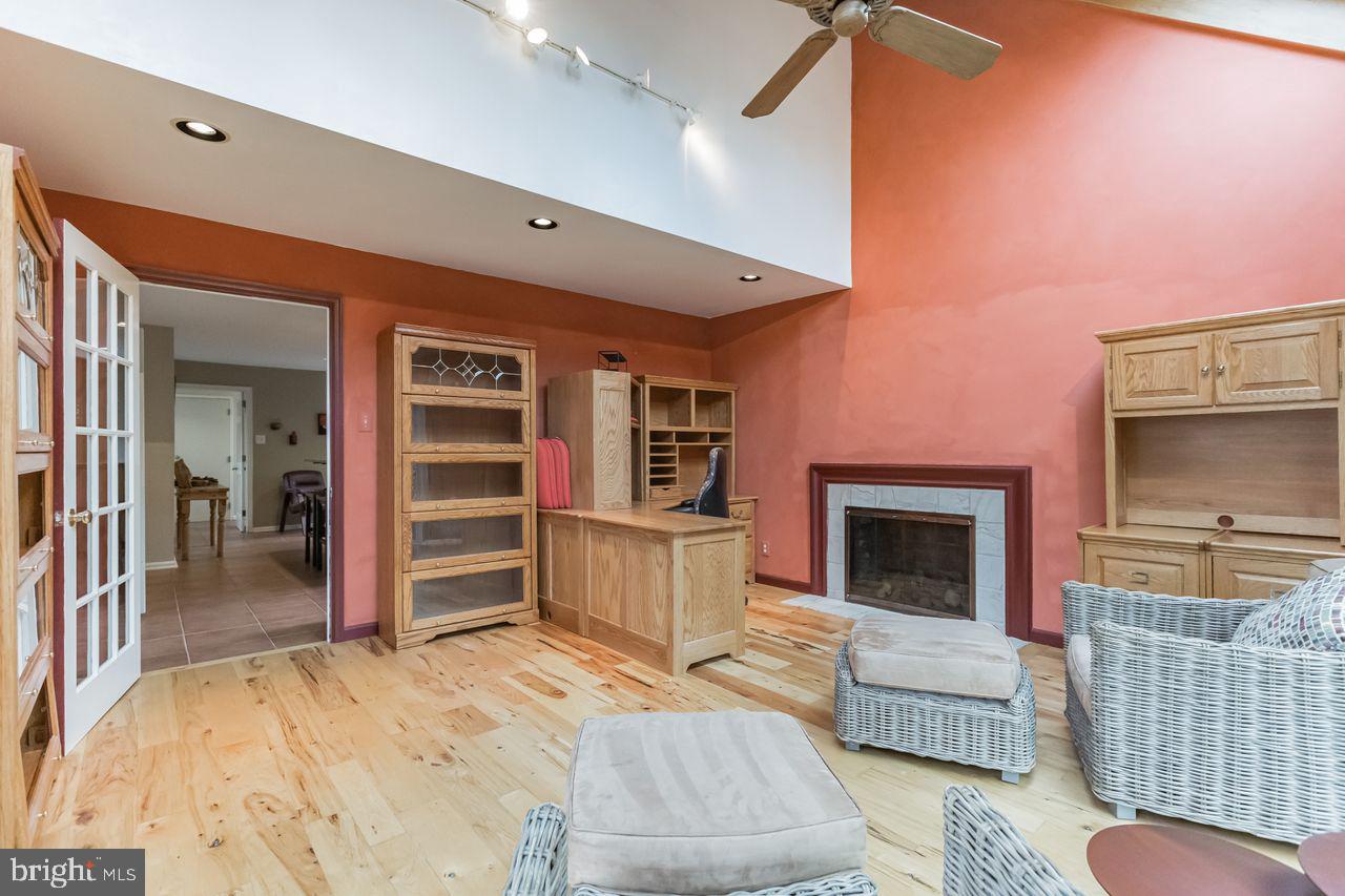 540 Harriton Road Bryn Mawr, PA 19010 - Photo 17 of 35 a living room with furniture and a fireplace