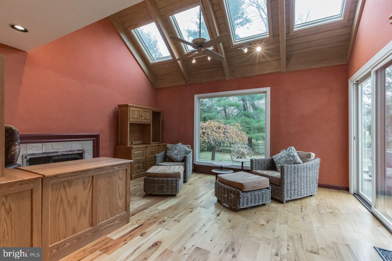 540 Harriton Road Bryn Mawr, PA 19010 - Photo 18 of 35 a living room with furniture and a flat screen tv