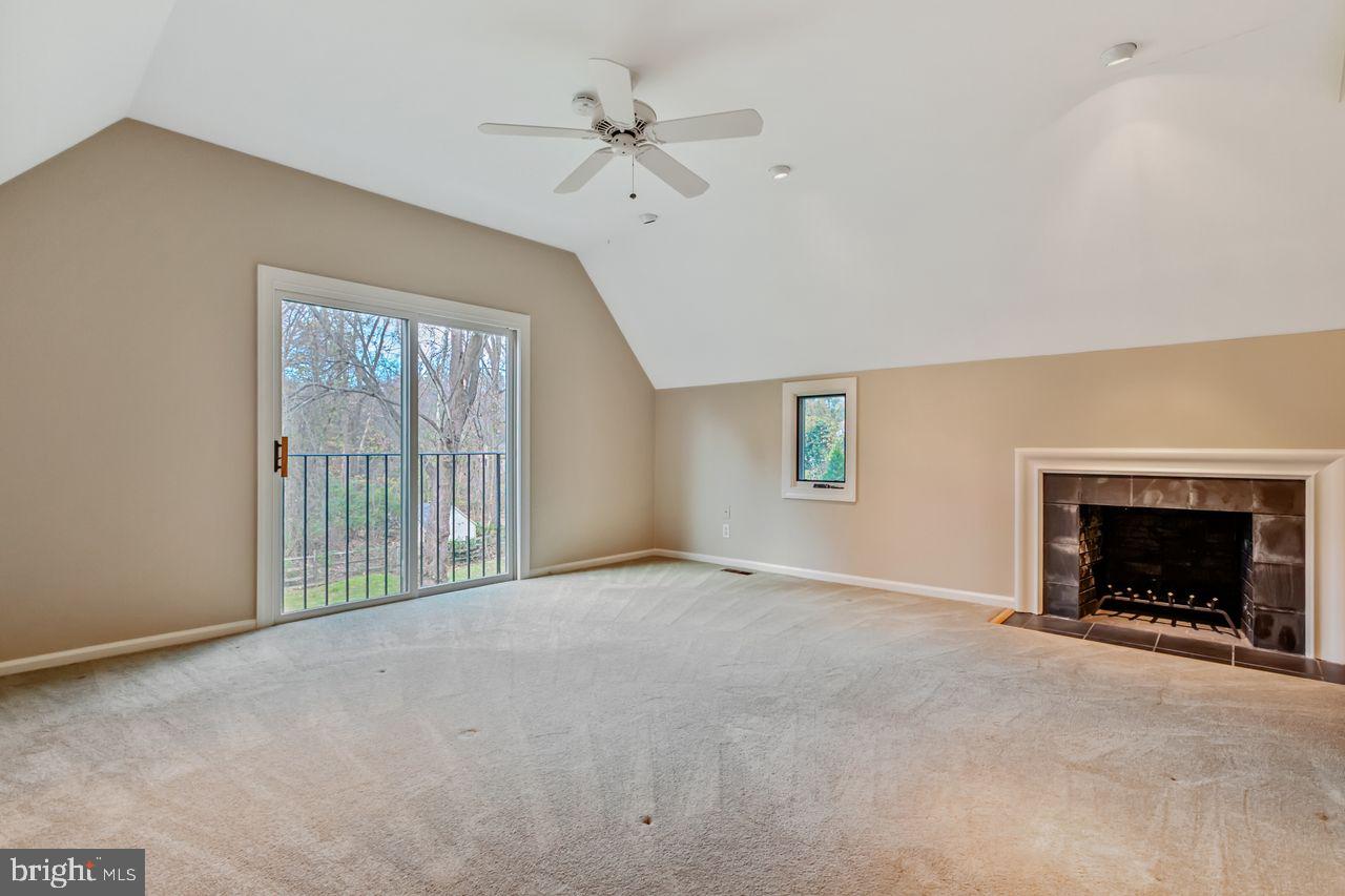 540 Harriton Road Bryn Mawr, PA 19010 - Photo 20 of 35 a view of an empty room with a fireplace