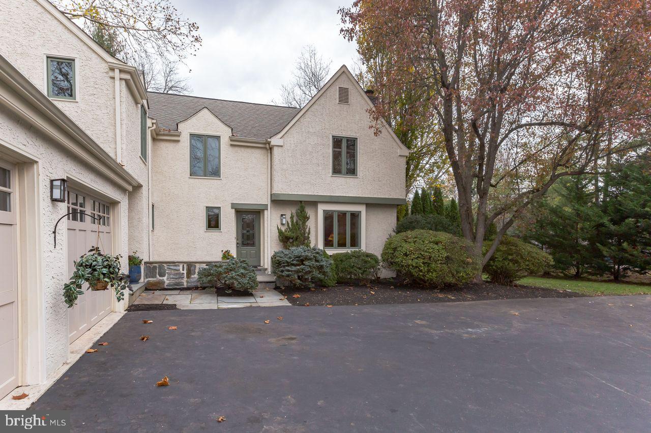 540 Harriton Road Bryn Mawr, PA 19010 - Photo 3 of 35 a front view of a house with a yard