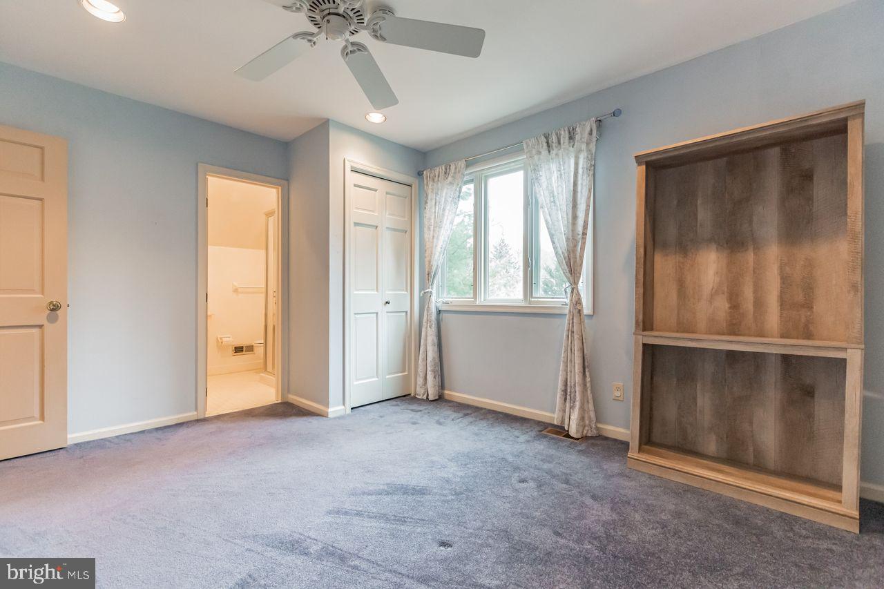 540 Harriton Road Bryn Mawr, PA 19010 - Photo 25 of 35 a view of an empty room with a window