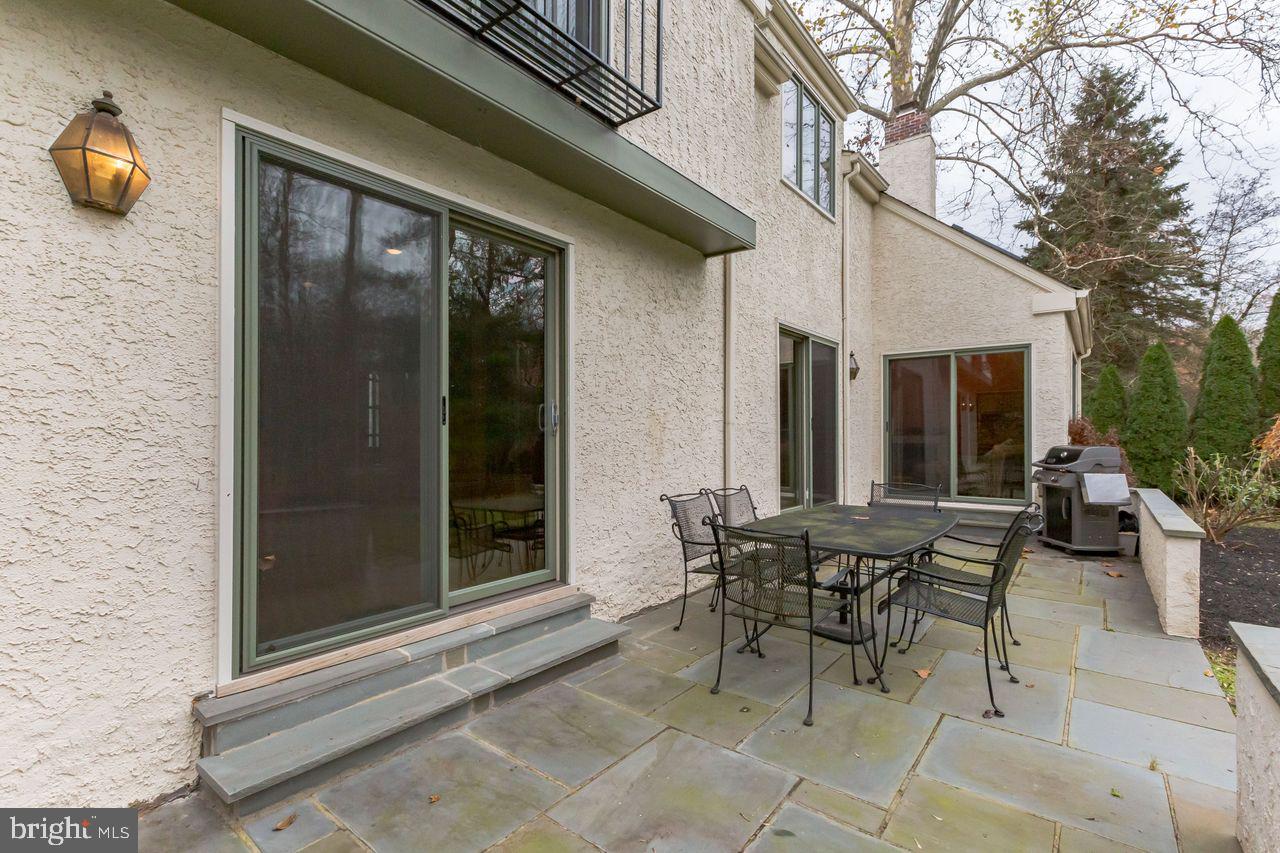 540 Harriton Road Bryn Mawr, PA 19010 - Photo 32 of 35 a view of a dinning tables and chairs in patio of the house