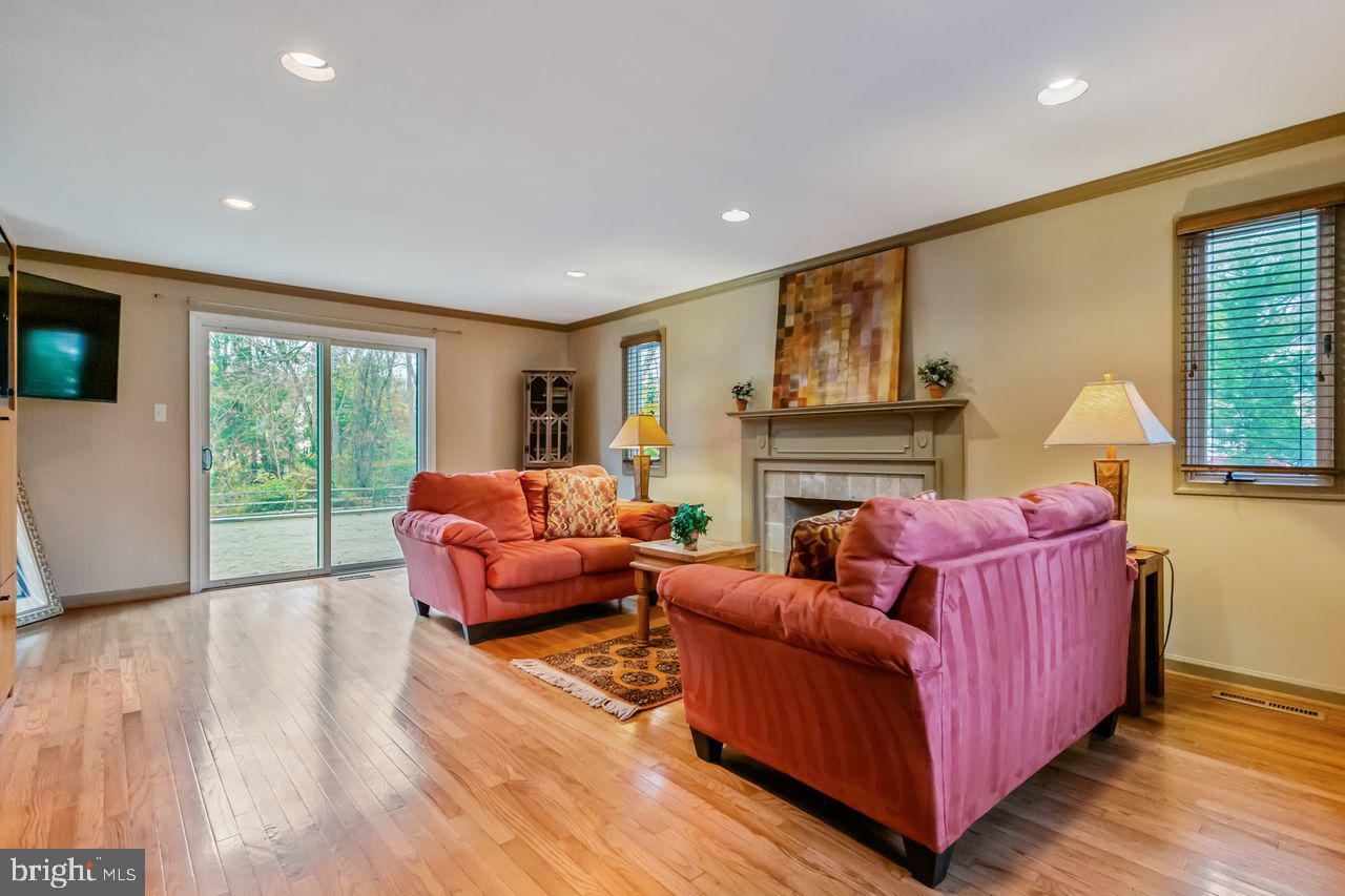 540 Harriton Road Bryn Mawr, PA 19010 - Photo 6 of 35 a living room with furniture and a fireplace
