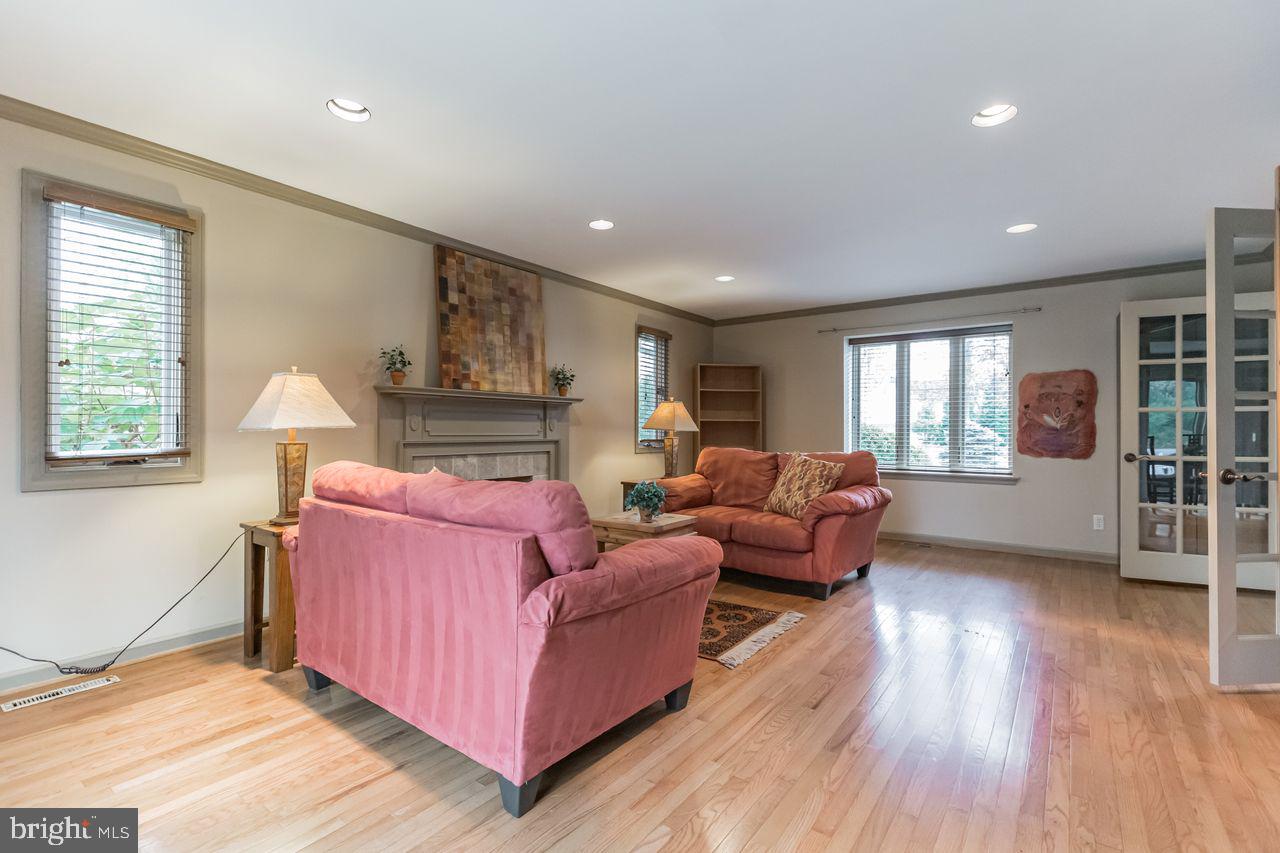 540 Harriton Road Bryn Mawr, PA 19010 - Photo 8 of 35 a living room with furniture and a fireplace