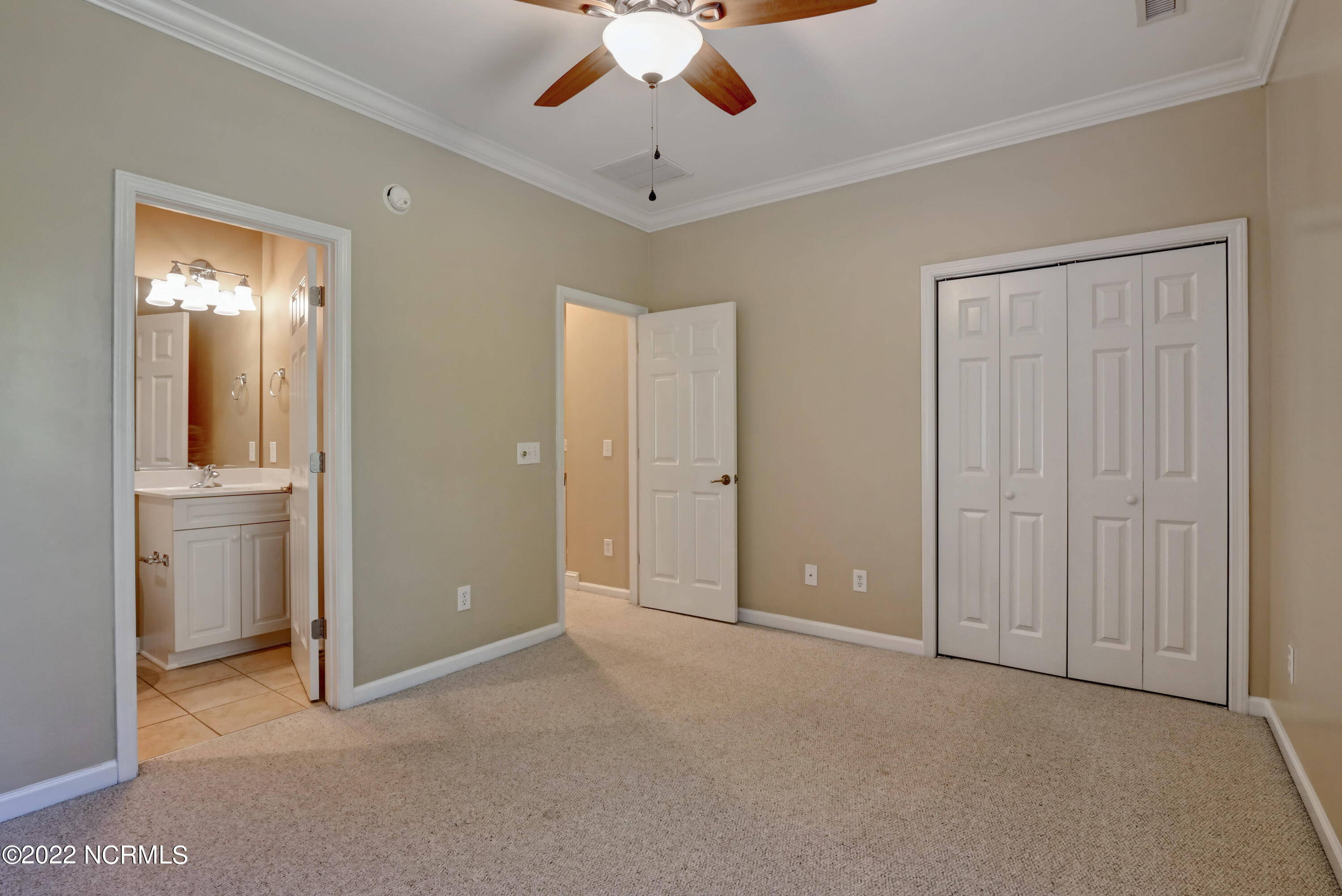 610 River Ridge Road, Unit 1 Shallotte, NC 28470 - Photo 29 of 88 Bedroom 2 with ensuite bath