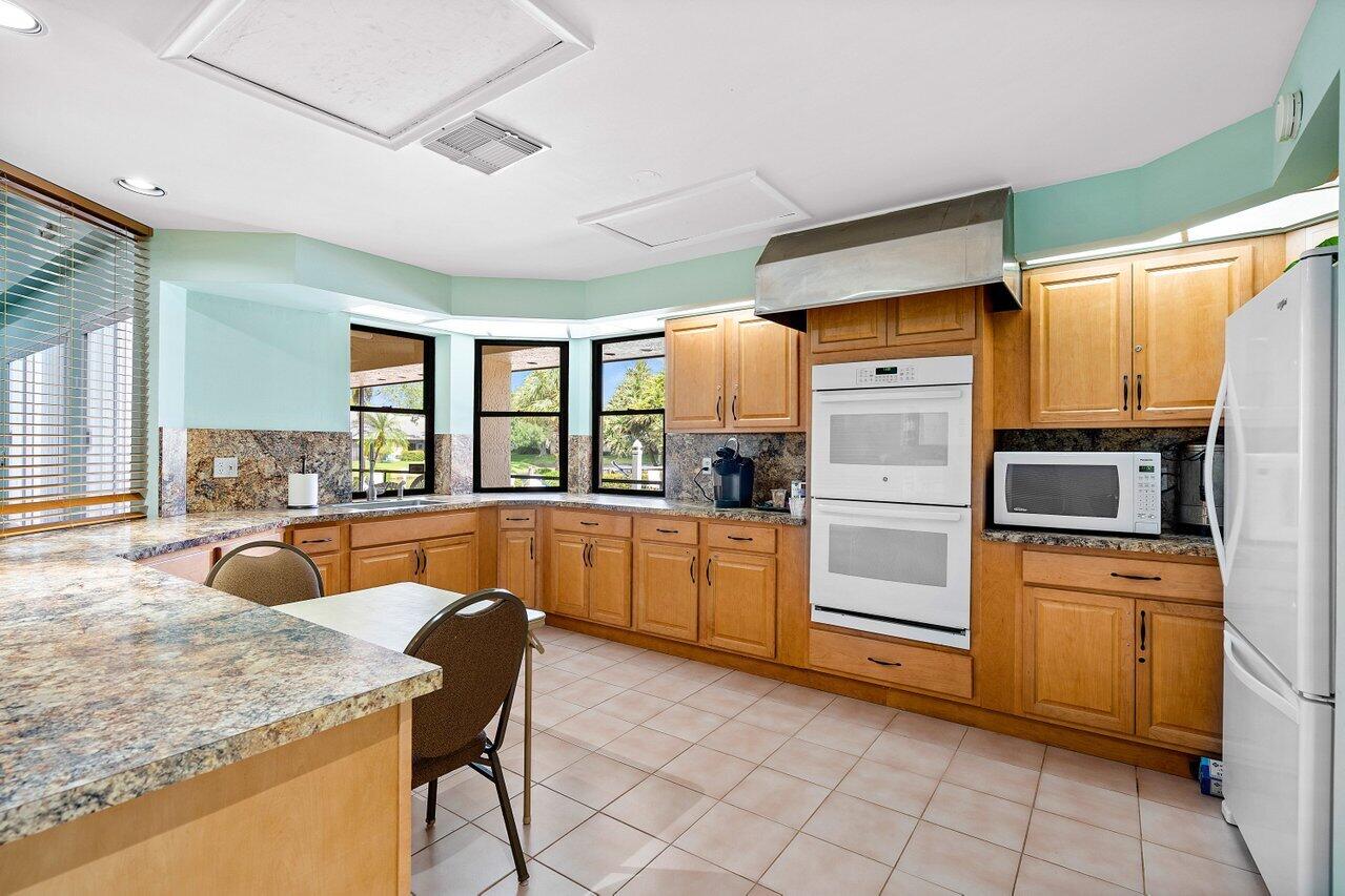 10904 Waterberry Court Boca Raton, FL 33498 - Photo 30 of 37 Clubhouse/Kitchen