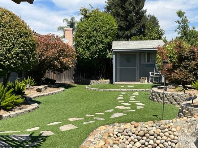 1278 Nelson Boulevard Selma, CA 93662 - Photo 11 of 14 a front view of a house with a yard