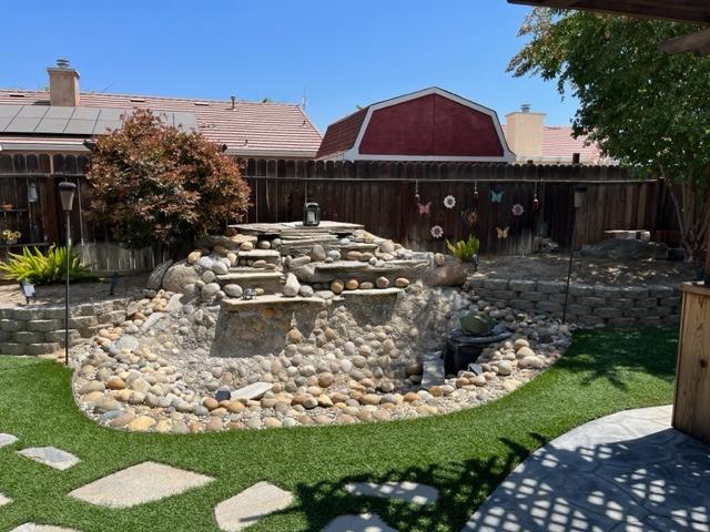 1278 Nelson Boulevard Selma, CA 93662 - Photo 13 of 14 a view of a house with backyard porch and sitting area