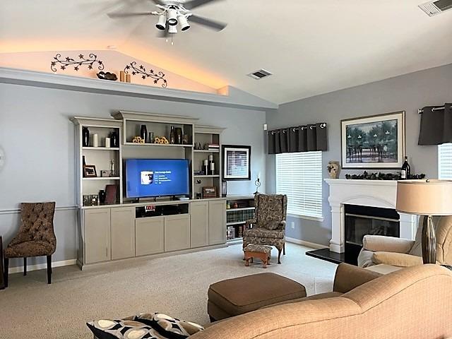 1278 Nelson Boulevard Selma, CA 93662 - Photo 3 of 14 a living room with furniture and a fireplace