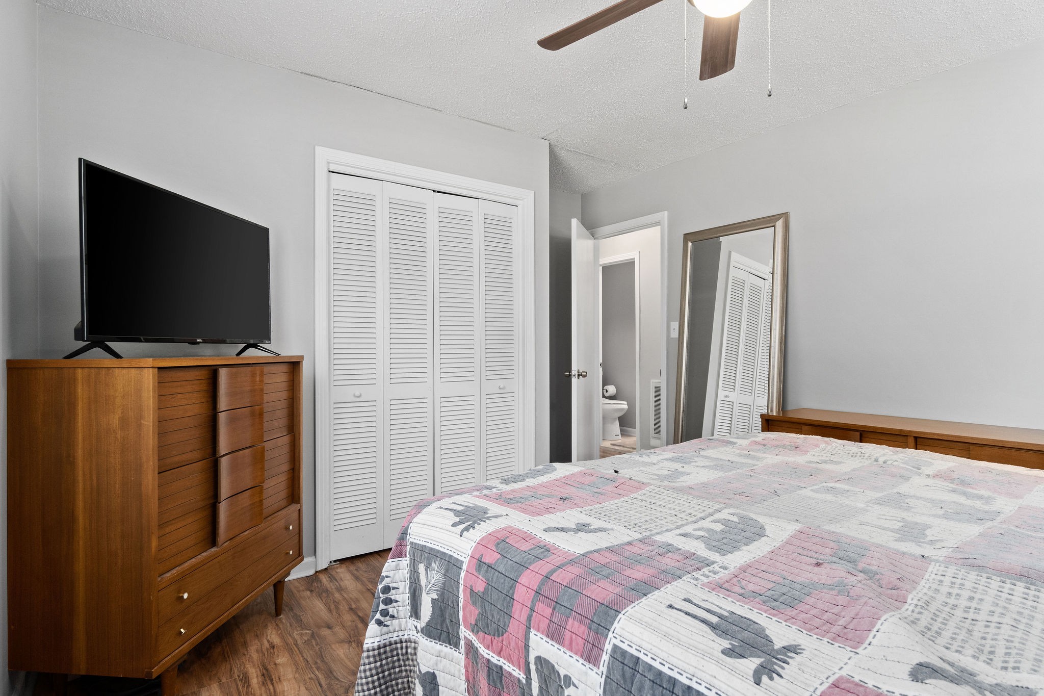 573 Lafayette Road Clarksville, TN 37042 - Photo 19 of 31 a bedroom with a bed and a flat screen tv