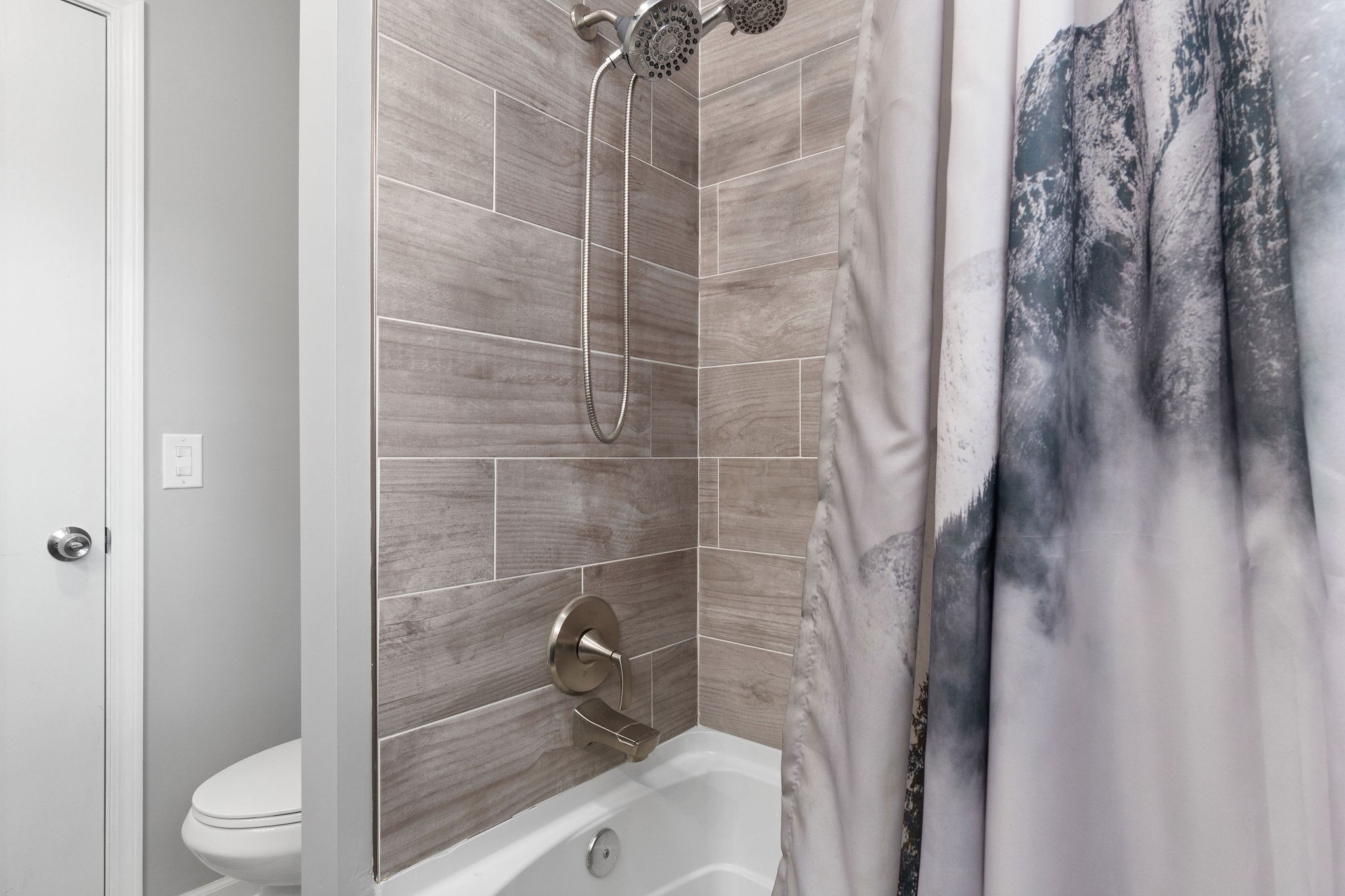 573 Lafayette Road Clarksville, TN 37042 - Photo 24 of 31 a bathroom with a toilet and shower