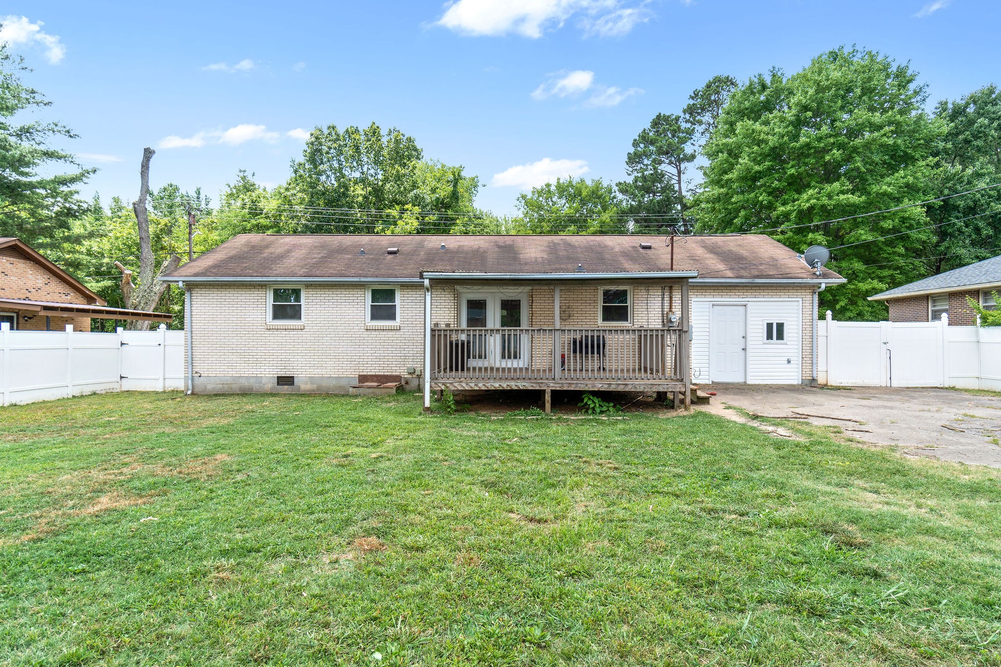 573 Lafayette Road Clarksville, TN 37042 - Photo 29 of 31 a view of a house with a backyard and a tree