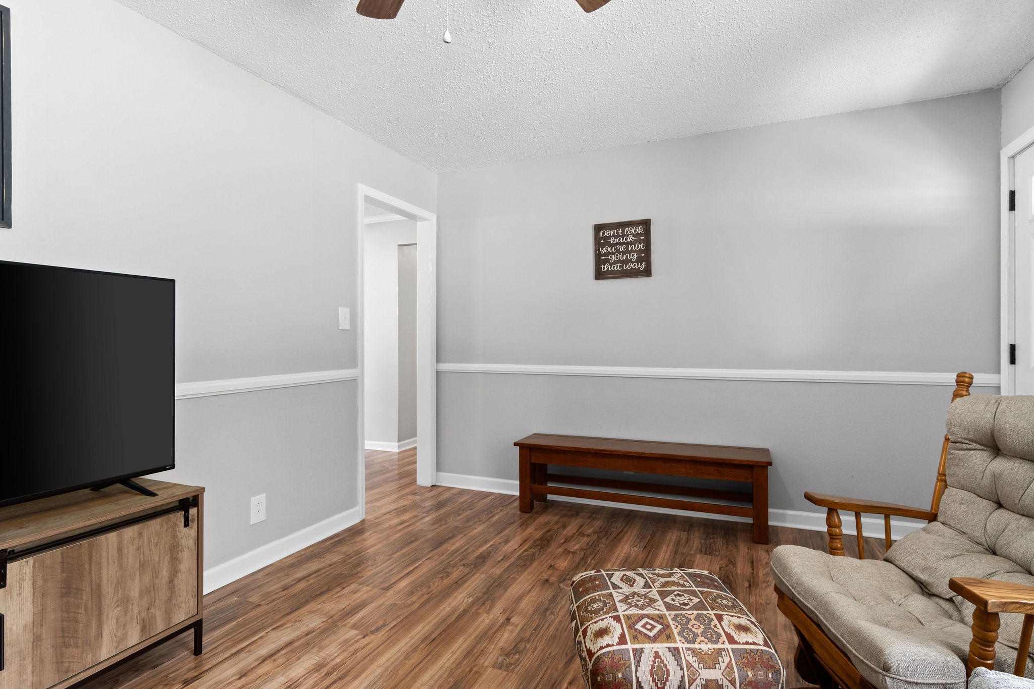 573 Lafayette Road Clarksville, TN 37042 - Photo 6 of 31 a living room with furniture and a flat screen tv