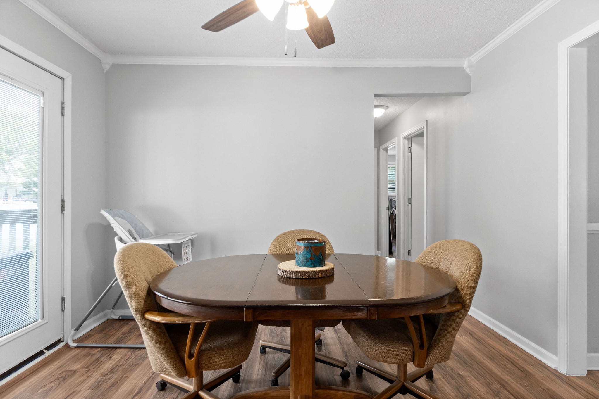 573 Lafayette Road Clarksville, TN 37042 - Photo 9 of 31 a view of a dining room with furniture and wooden floor